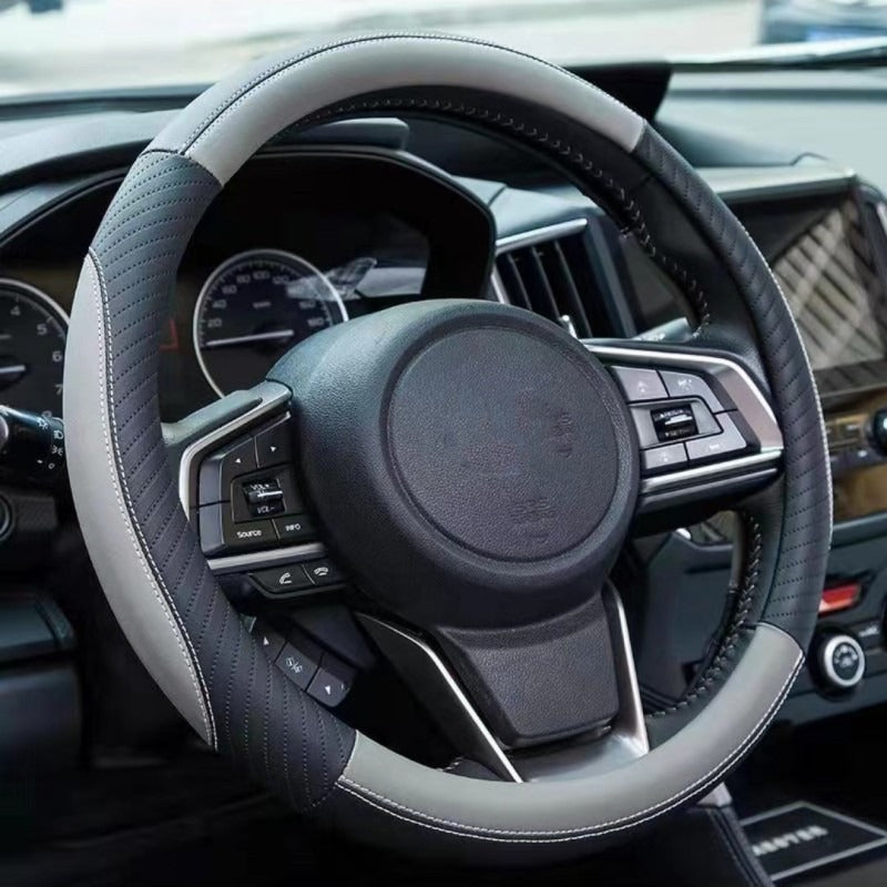 🔥Navlaka za volan od prave kože - Univerzalna navlaka za volan automobila, neklizajuća, izdržljiva