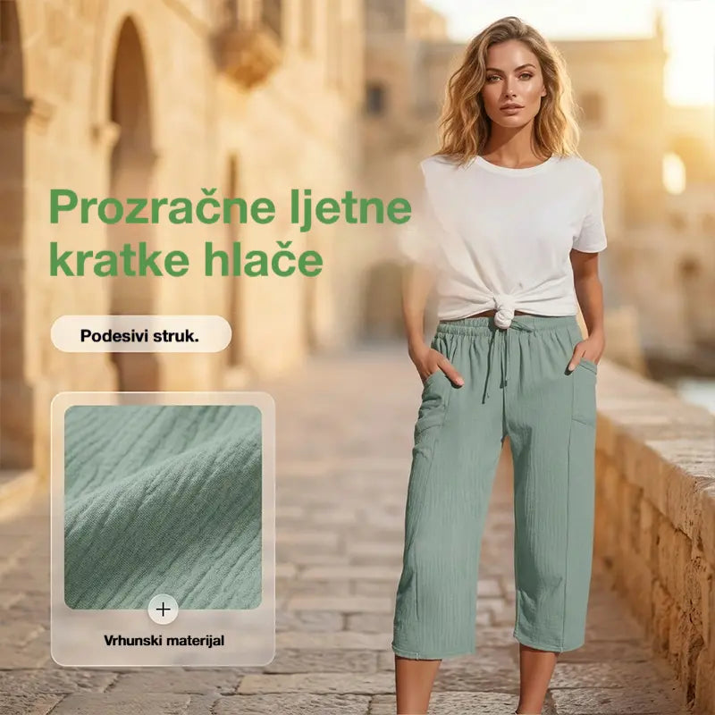 Ženske jednobojne plisirane capri hlače od pamuka i lana - hladne i prozračne, laskaju obliku nogu, elegantne i ležerne