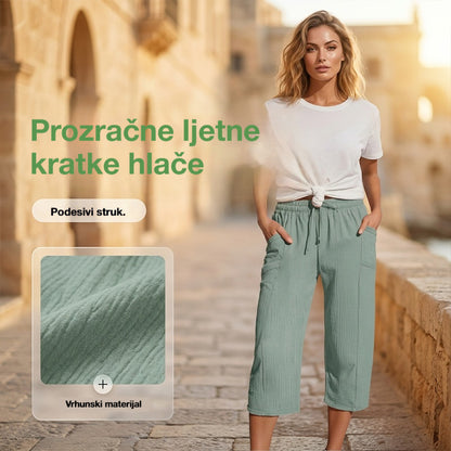 💖👖👖Ženske jednobojne plisirane capri hlače od pamuka i lana - hladne i prozračne, laskaju obliku nogu, elegantne i ležerne