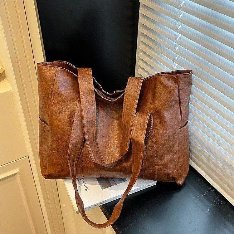 ✨👜【Ograničeno vrijeme 50% popusta】Ležerna ženska torba za rame velikog kapaciteta—👠o singură geantă este tot ce ai nevoie!