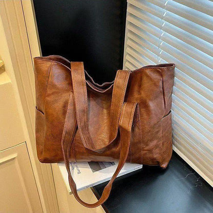 ✨👜【Ograničeno vrijeme 50% popusta】Ležerna ženska torba za rame velikog kapaciteta—👠o singură geantă este tot ce ai nevoie!