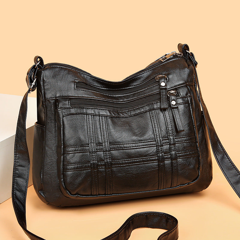 2024 Geantă de umăr la moda simplă piele moale geantă de commute crossbody generos