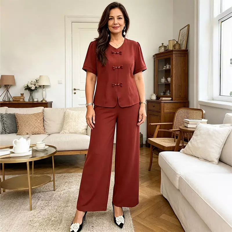 💖【Ljetni popust od 50%】【M-4XL】Elegantno i ležerno žensko odijelo, izrađeno od lagane tkanine - s ukrasnim gumbima i lepršavim hlačama.