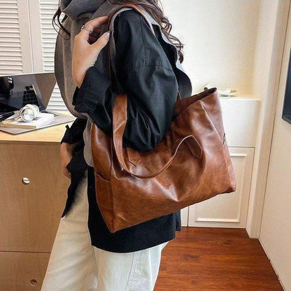 ✨👜【Ograničeno vrijeme 50% popusta】Ležerna ženska torba za rame velikog kapaciteta—👠o singură geantă este tot ce ai nevoie!