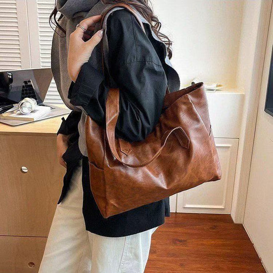 ✨👜【Ograničeno vrijeme 50% popusta】Ležerna ženska torba za rame velikog kapaciteta—👠o singură geantă este tot ce ai nevoie!