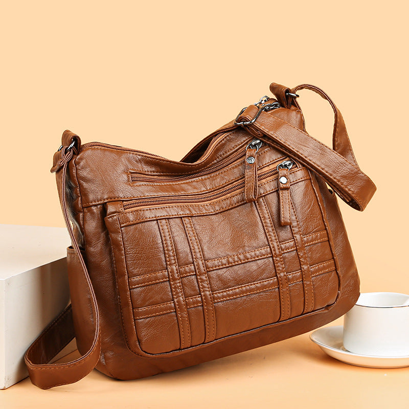 2024 Geantă de umăr la moda simplă piele moale geantă de commute crossbody generos